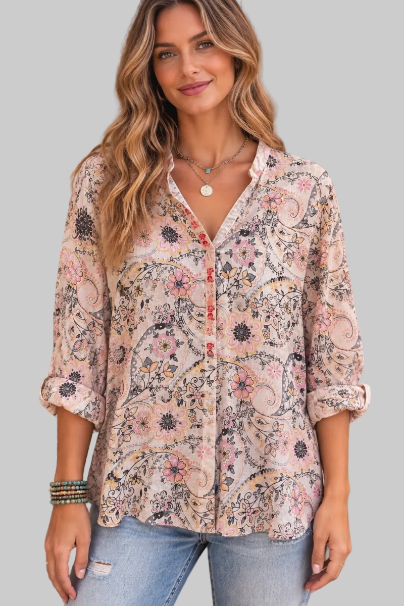 Trestles Clothing Company floral cotton blouse with mandarin collar and ribbon detail worn by a smiling model